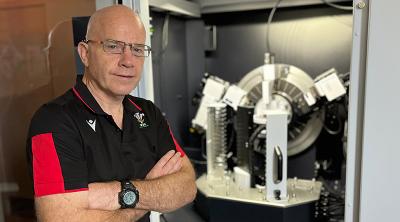 Professor Steve Hiller, who leads the globally leading mineralogy department at The James Hutton Institute, and the new XRD machine.