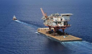 Oil rig being towed